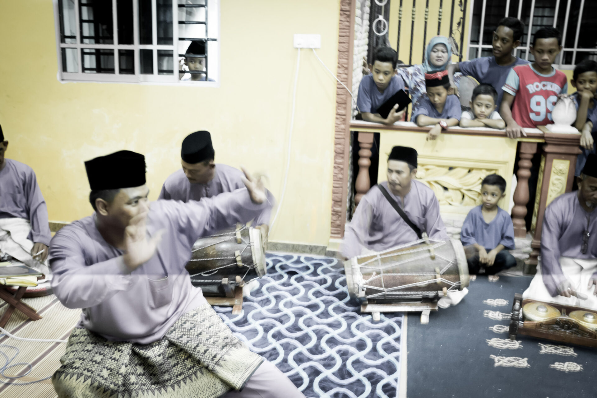 Persatuan Kompang Kg Madirono team performing, spectators