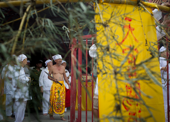 A man in yellow walking