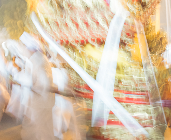 A blurred photo of a festival