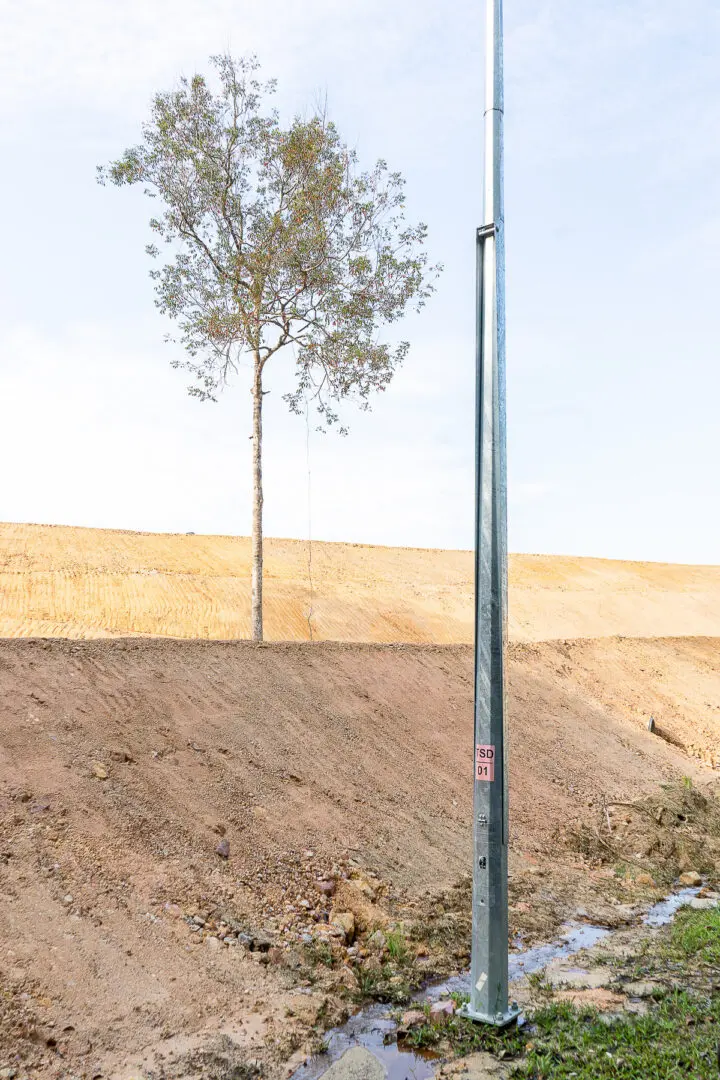 A pole on barren land